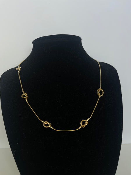 Golden Embrace Knot Necklace